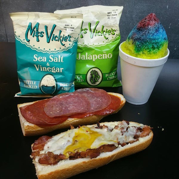 Foto diambil di Rockaway Beach ATX Shaved Ice &amp; Subs oleh Corey R. pada 11/28/2015