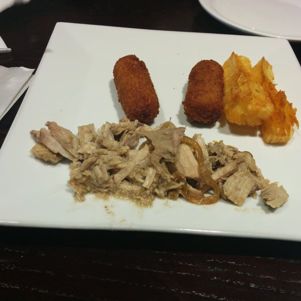 The combinacio was sad; only two yuca fries, but the pork was flavorful. Empanadas were greasy, dry meat inside, and sugar sprinkled on the outside. I didn't sense pride in food or service from staff.