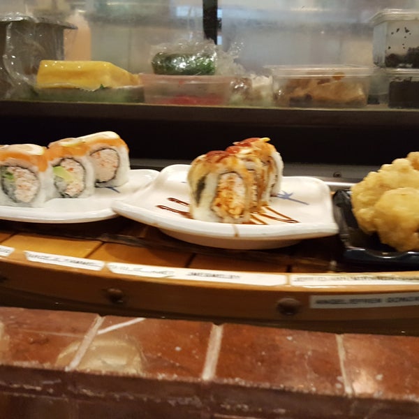 Sushi boats go around the bar. Order the famous Shark Roll. Great choices for families. Been a good local restaurant for 25+ years.