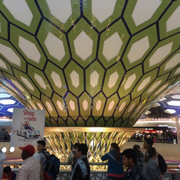 Photo taken at Zayed International Airport (AUH) by Ruslan D. on 3/5/2015