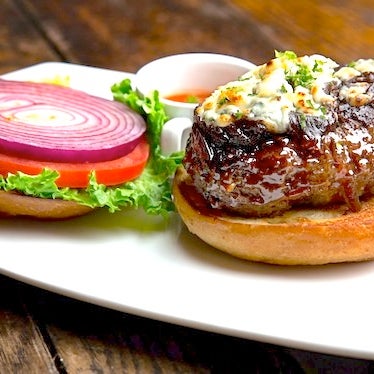 Seared beef patty on a brioche with your choice of cheese and a side of balsamic red onion jam.