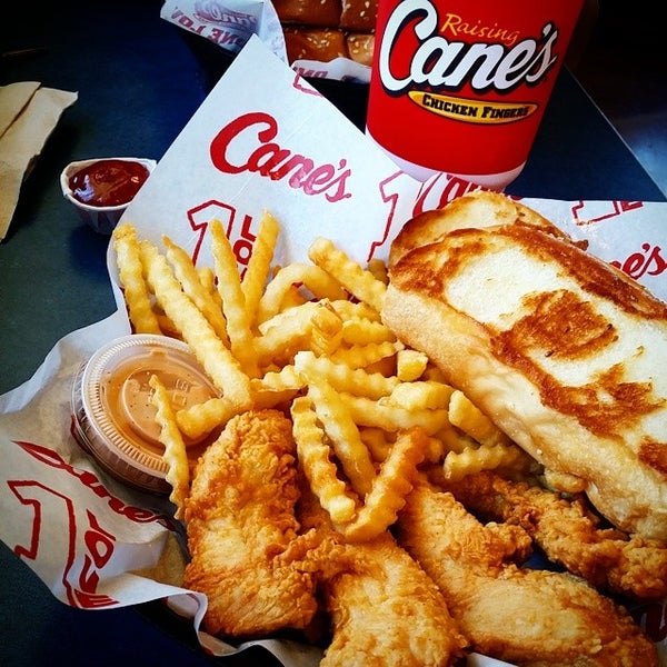 Photo taken at Raising Cane&#39;s Chicken Fingers by Rolynne M. on 6/29/2014