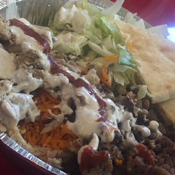 Photo taken at The Halal Guys by L . on 8/14/2016