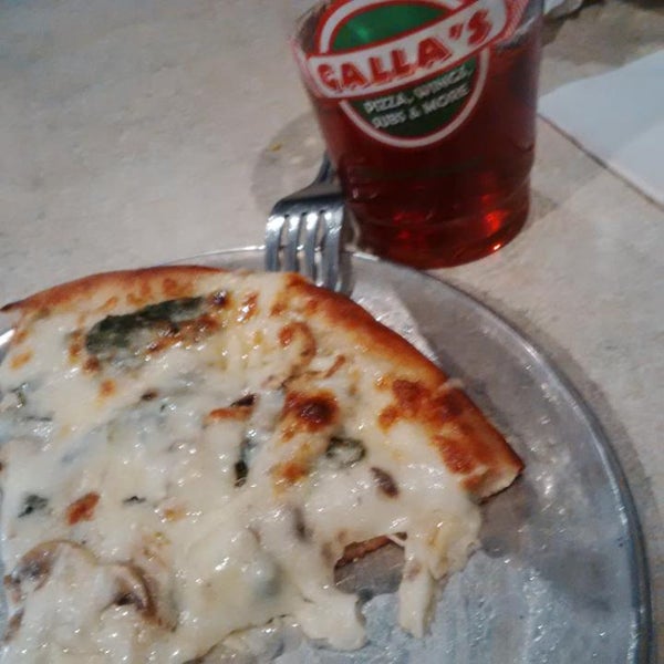 Photo taken at Galla&#39;s Pizza by ERIC on 3/1/2015
