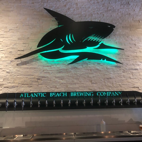 Photo taken at Atlantic Beach Brewing Company by Robbie C. on 8/1/2019