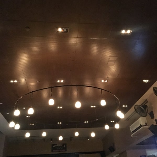 Photo taken at Harry&#39;s Italian Pizza Bar by Angel L. on 5/29/2019