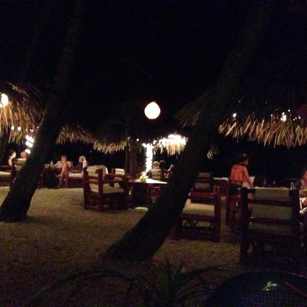 Photo taken at La Vela Latina Beach Bar by Angel L. on 11/18/2014