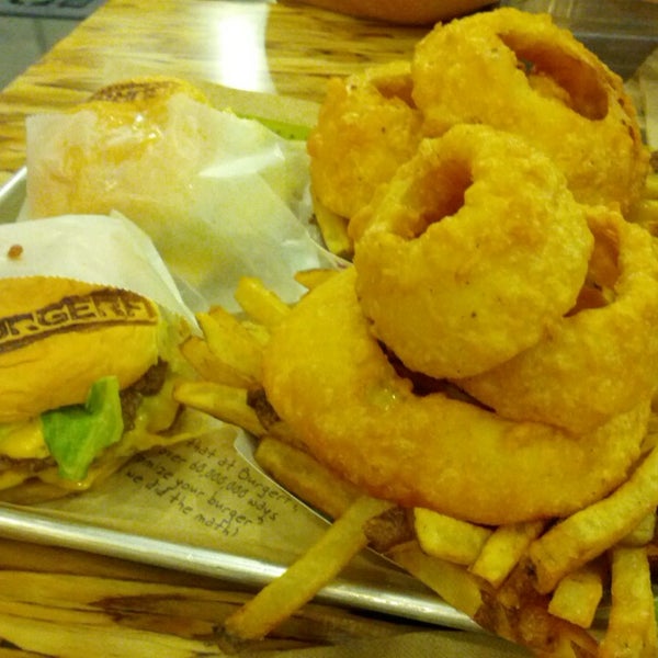 Photo taken at BurgerFi by timothy j. on 7/19/2013