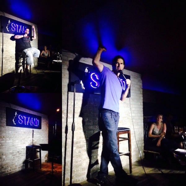 Photo taken at The Stand Restaurant &amp; Comedy Club by Christi P. on 8/1/2015