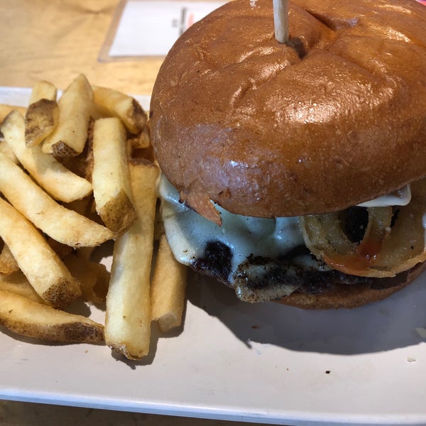 Photo taken at Crave Real Burgers by Jack W. on 5/16/2018