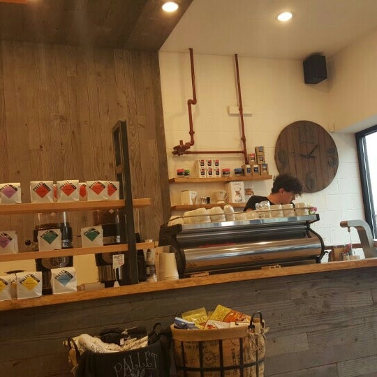 Photo taken at Pallet Coffee Roasters by Amy W. on 3/13/2016