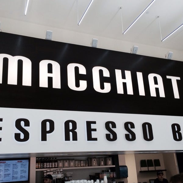 Photo taken at Macchiato Espresso Bar by Lu B. on 6/1/2014
