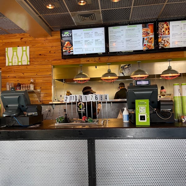 Photo taken at BurgerFi by Ted J B. on 8/25/2021