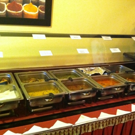 Photo taken at Viva Goa Indian Cuisine by Christina H. on 6/28/2012