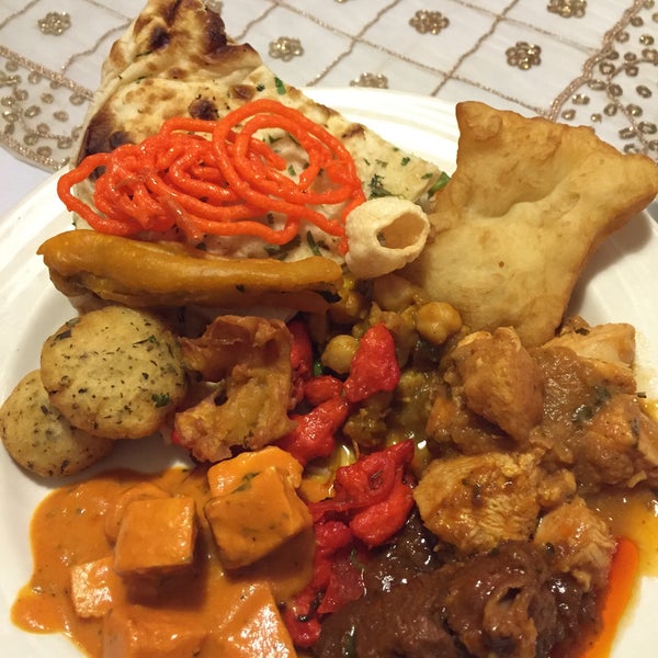 Photo taken at New Taste of India by James E. on 3/29/2015