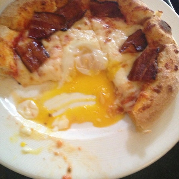 The breakfast pizza is flavorful and large enough to share with another person.