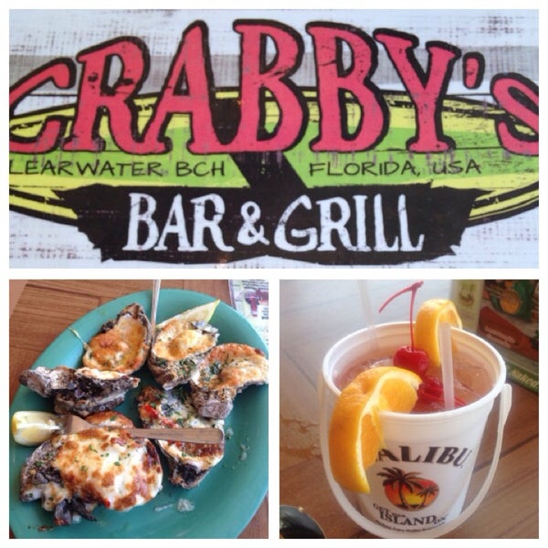 Photo taken at Crabby Bar &amp; Grill by Eugenia D. on 10/31/2013
