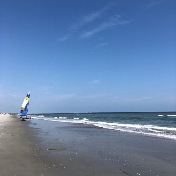 Photo taken at Ocean Isle Beach by Adam W. on 8/1/2019