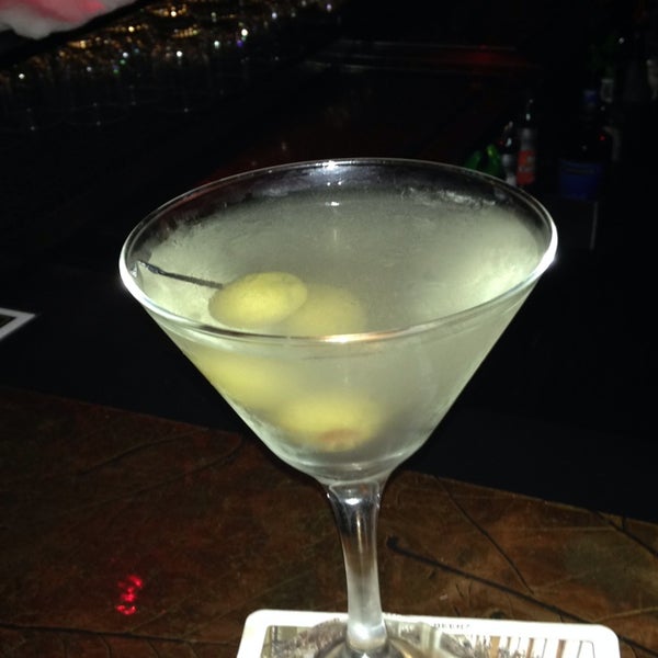 Photo taken at Deja Vu Martini Lounge by Chris W. on 7/19/2014
