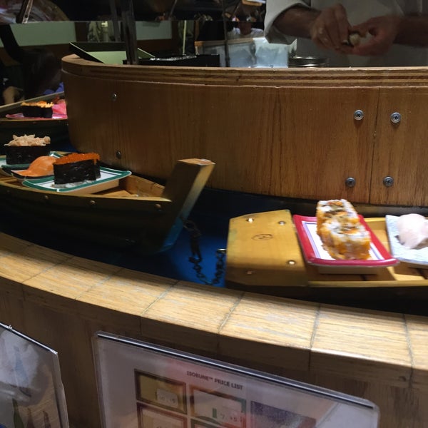 Photo taken at Isobune Sushi by Tom C. on 9/2/2015