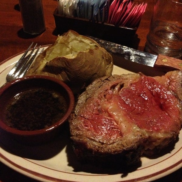 Photo taken at Chuck&#39;s Steak House by Brianna L. on 4/29/2013