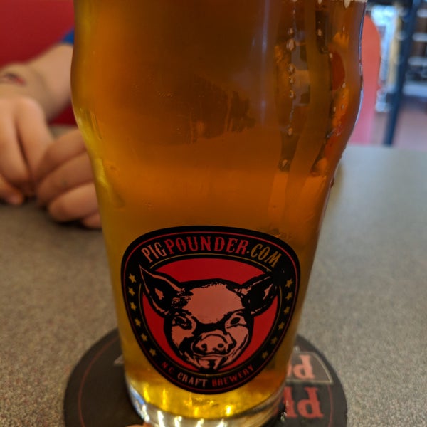 Photo taken at Pig Pounder Brewery by Jason Y. on 4/14/2018