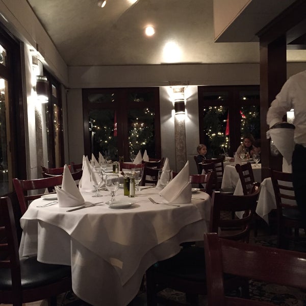 Photo taken at Dimora Restaurant by Richard G. on 12/19/2014