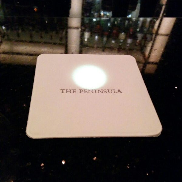 Photo taken at The Bar at The Peninsula by Anom on 3/22/2014