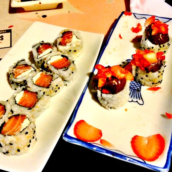 Photo taken at Sushi Garden by Chai C. on 6/15/2014