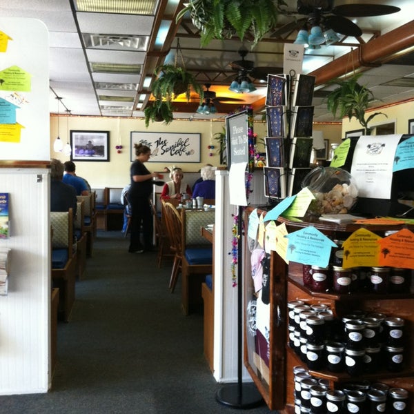 Photo taken at The Sanibel Café by Laura P. on 12/23/2012