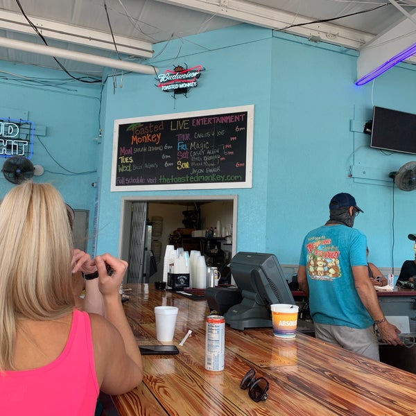 Photo taken at Toasted Monkey Beach Bar by Chris V. on 10/17/2020