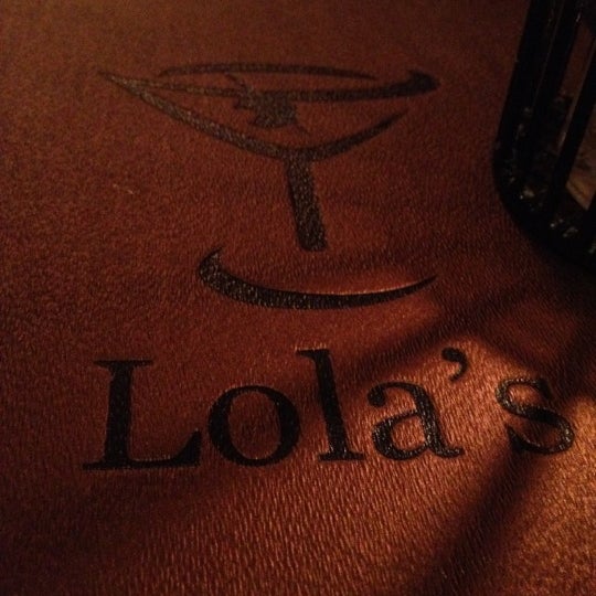 Photo taken at Lola&#39;s by Johnny J. on 12/15/2012