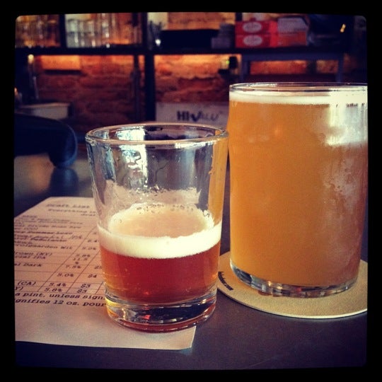 Photo taken at Alphabet City Beer Co. by Jennifer W. on 7/14/2012