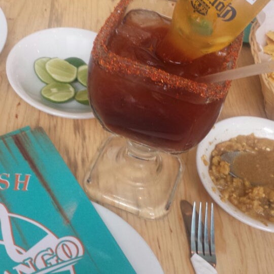 Photo taken at Cayomango Fish &amp; Drinks by Rosa M. on 4/4/2015