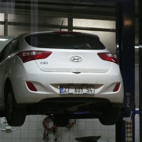 Photo taken at Hyundai/Nissan Dealer by Okan T. on 12/4/2014