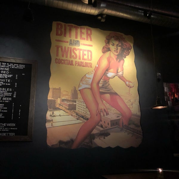 Photo taken at Bitter &amp; Twisted Cocktail Parlour by Raquel M. on 2/1/2018