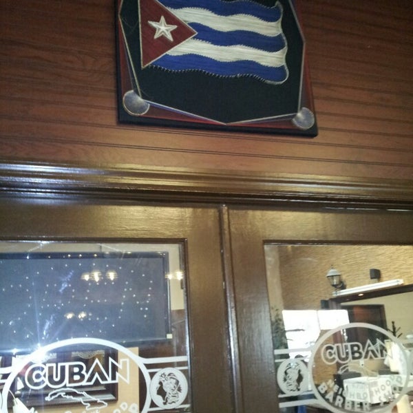 Photo taken at Cuban Crafters by Mike C. on 5/23/2014