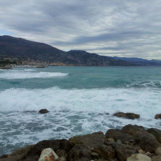 Photo taken at Plage de Roquebrune Cap Martin by Serge C. on 2/21/2012