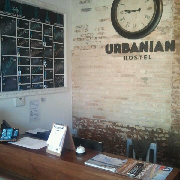 Photo taken at Urbanian Hostel by Marc R. on 3/8/2014