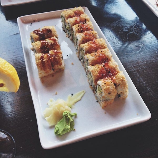 Photo taken at Baby Blue Sushi Sake Grill by Caitlin W. on 4/12/2014