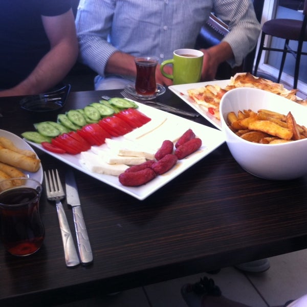 Photo taken at Tarçın Cafe &amp; Patisserie by Görkem A. on 6/14/2014