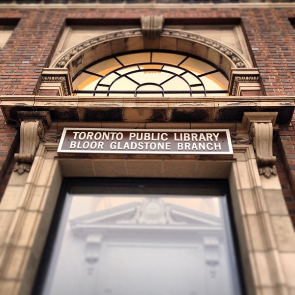 Photo taken at Toronto Public Library - Bloor Gladstone Branch by Jessica M. on 12/21/2013