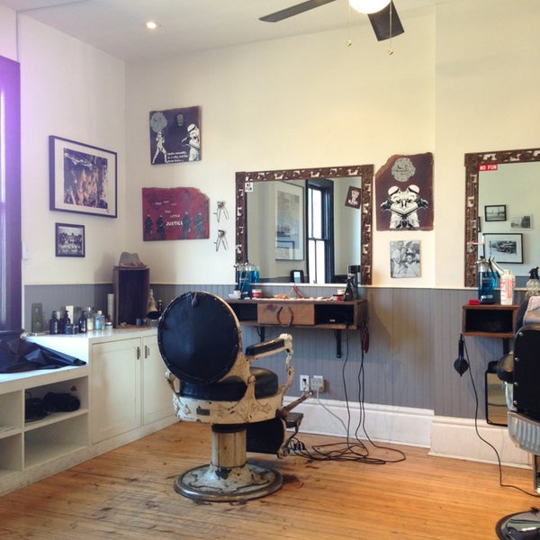 Photo taken at Garrison&#39;s by the park Barbershop by Ken S. on 3/14/2013