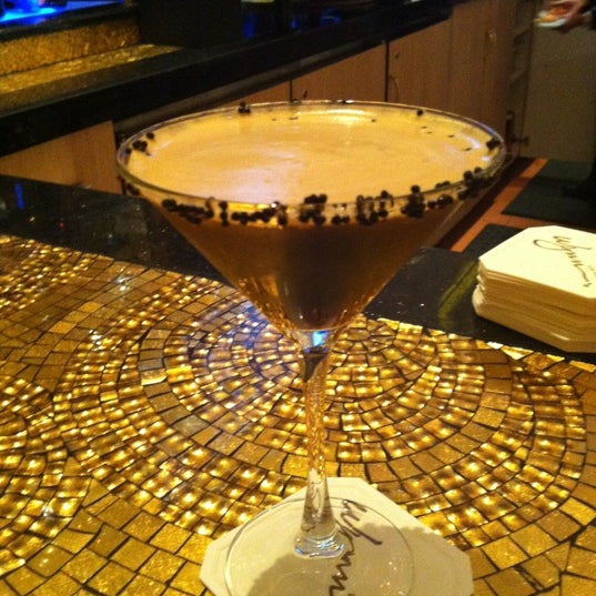 Photo taken at Tower Suite Bar at The Wynn by Tiffany G. on 10/21/2012