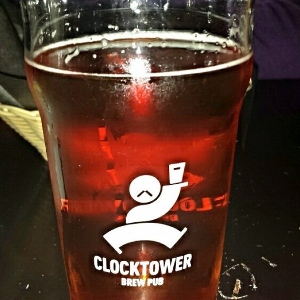Photo taken at Clocktower Brew Pub by Sébastien B. on 5/11/2014