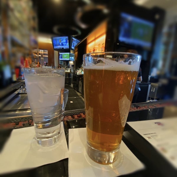 Photo taken at National Pastime Sports Bar &amp; Grill by Brian F. on 10/15/2019