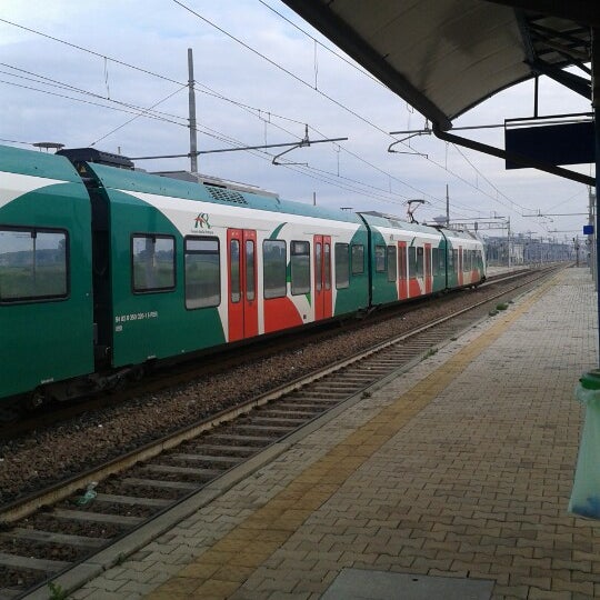 Photo taken at Stazione Poggio Rusco by Natalia M. on 5/7/2014