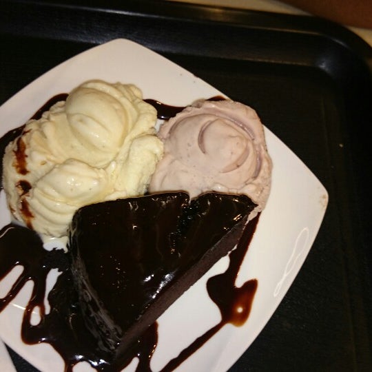 Moist chocolate cake with ice creams..but expensive here..