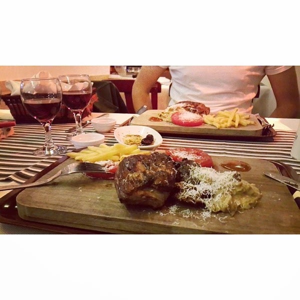 Photo taken at Marina&#39;s Steak &amp; Fish Restaurant by Selin S. on 9/21/2013