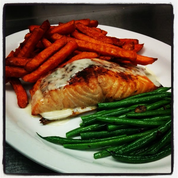 Bring your appetite - cedar planked salmon with sauteed string beans and sweet potato fries!